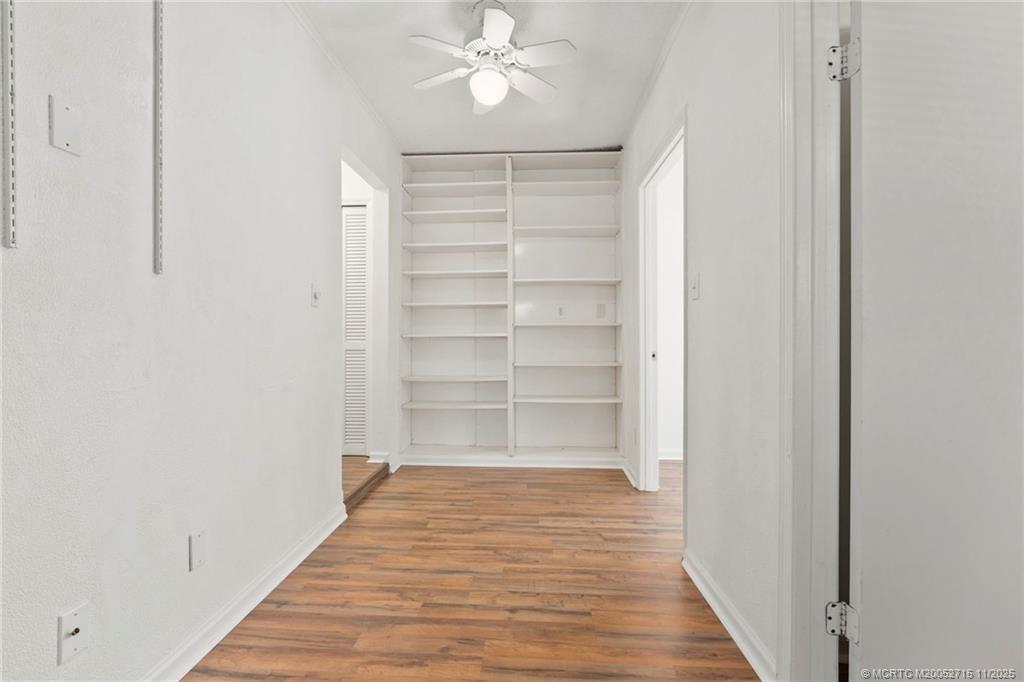 5801 Southeast Cable Drive Stuart, FL 34997 - Photo 24 of 48 a view of a room with wooden floor and closet