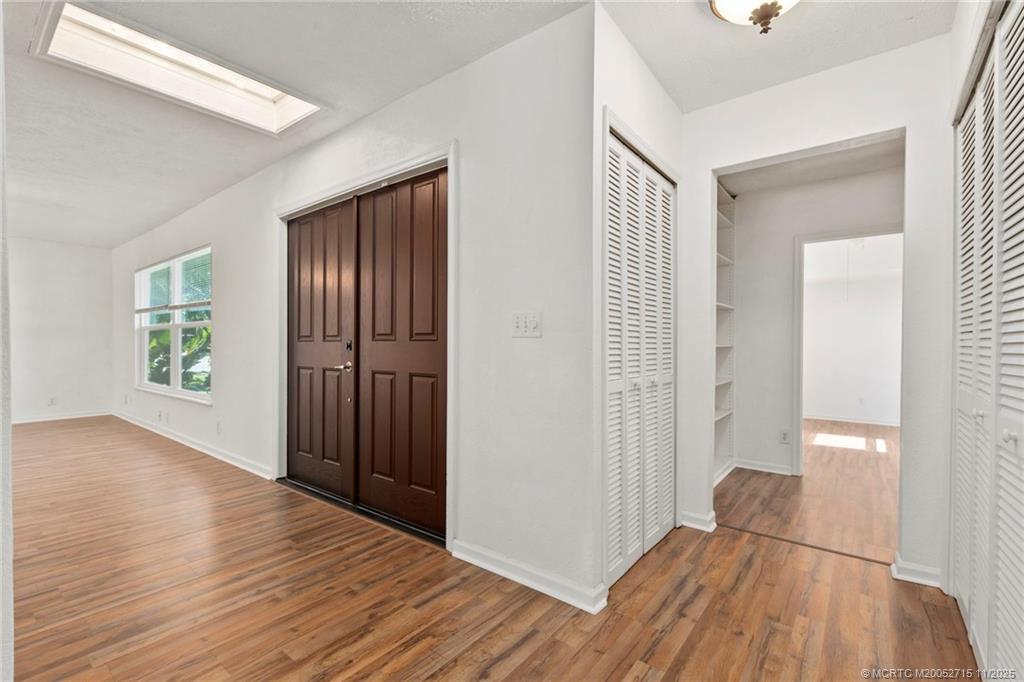 5801 Southeast Cable Drive Stuart, FL 34997 - Photo 26 of 48 wooden floor in an empty room with a window