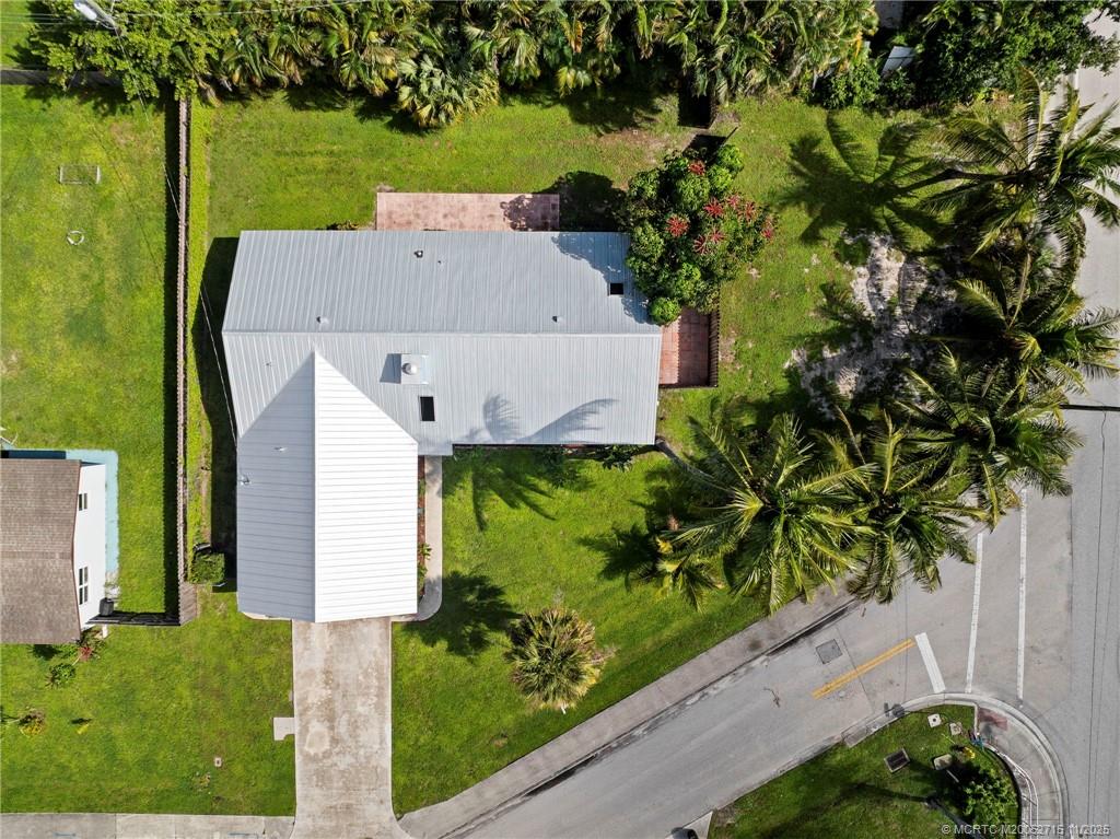5801 Southeast Cable Drive Stuart, FL 34997 - Photo 48 of 48 an aerial view of a house with a yard basket ball court and outdoor seating