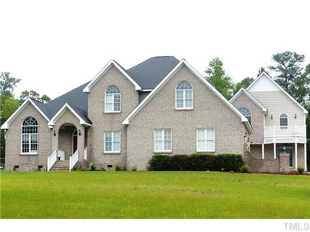 8209 Buffaloe Road Raleigh, NC 27616 - Photo 1 of 18 BEAUTIFUL BRICK EXTERIOR HOME with COVERED front and side porches. 4 CAR GARAGE and fenced in area in back yard! Exterior Front