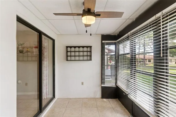 a view of a hallway with windows