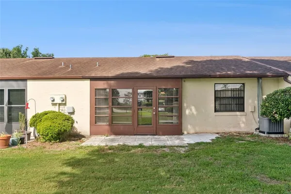 front view of a house with a big yard