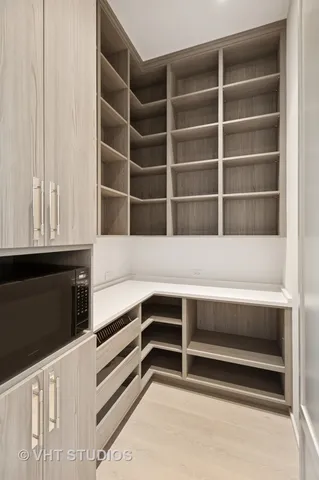 a view of an empty walk in closet