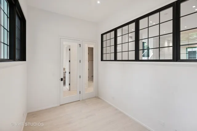 a view of staircase with white walls