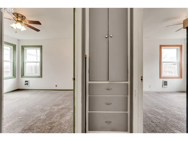 a view of an empty room and window