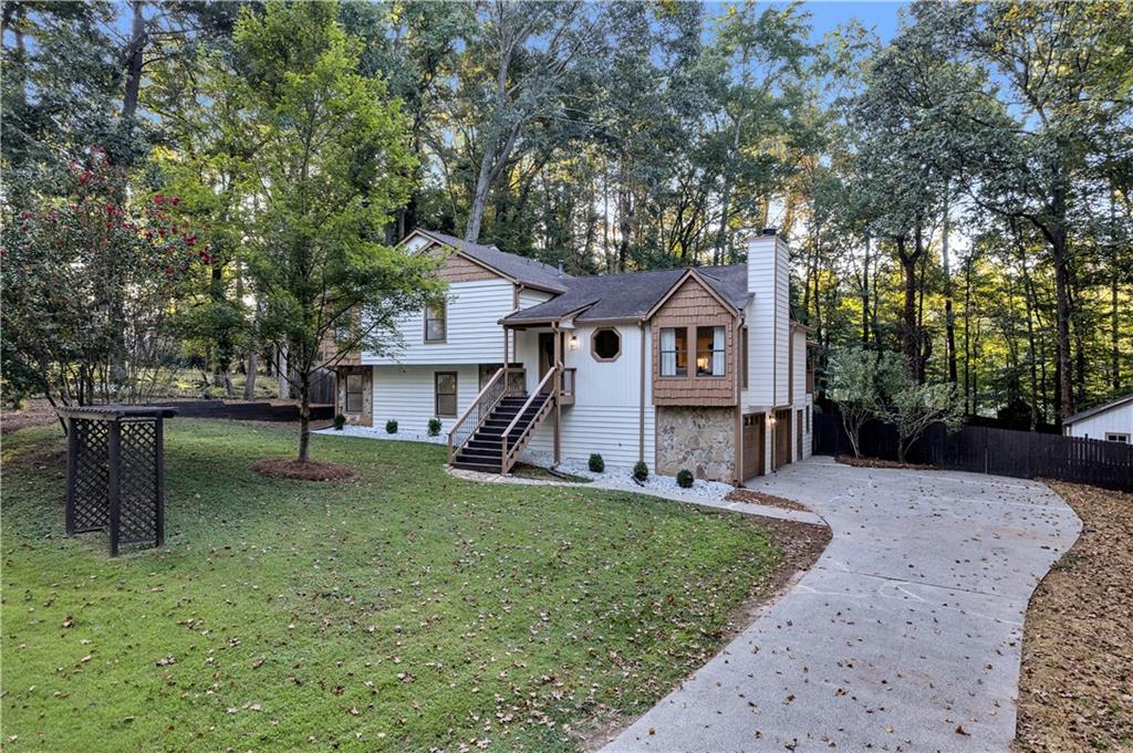 front view of a house with a yard