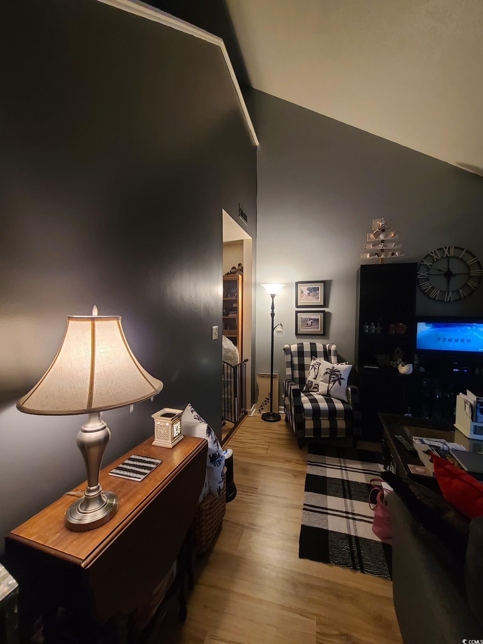 801 Burcale Road, Unit B2 Myrtle Beach, SC 29579 - Photo 14 of 30 Living room featuring light hardwood / wood-style