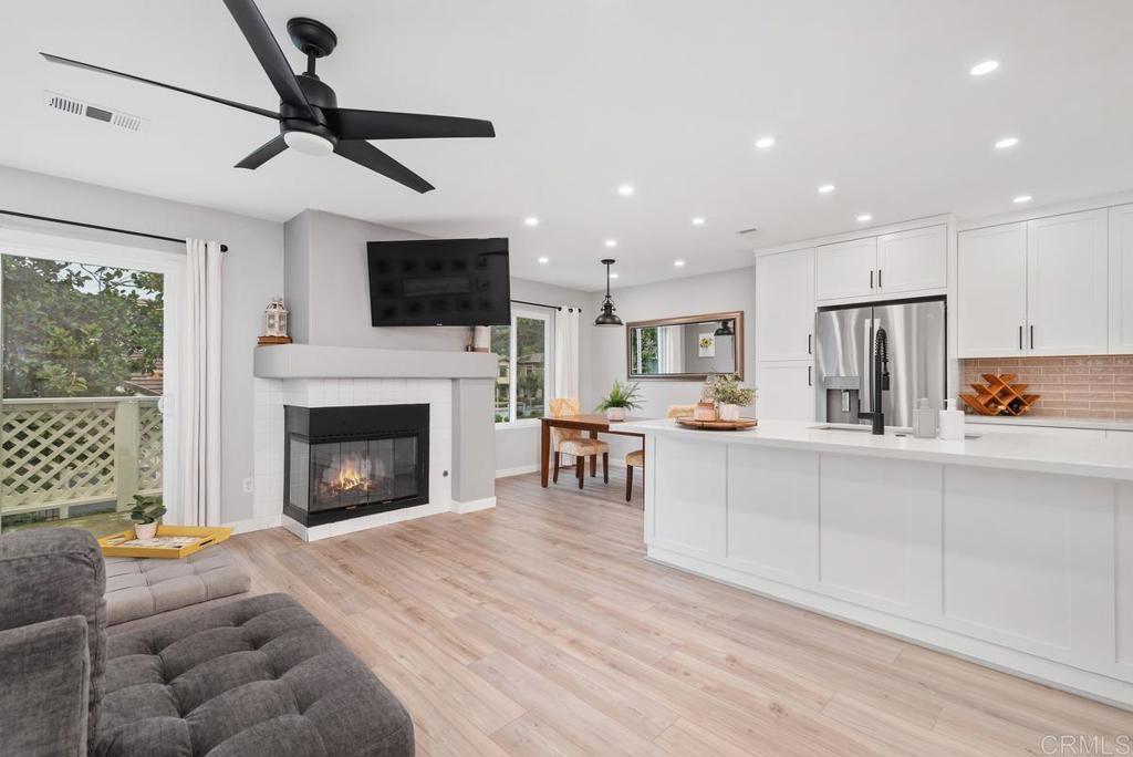 13981 Midland Road Poway, CA 92064 - Photo 1 of 26 a living room with furniture and a fireplace