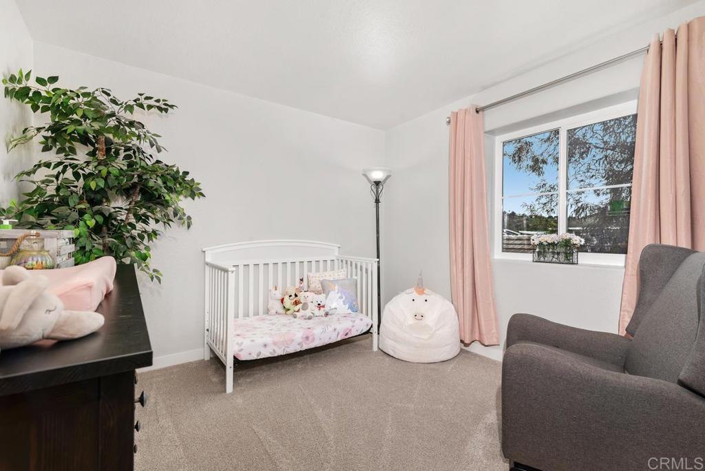 13981 Midland Road Poway, CA 92064 - Photo 15 of 26 a bedroom with furniture and a large window