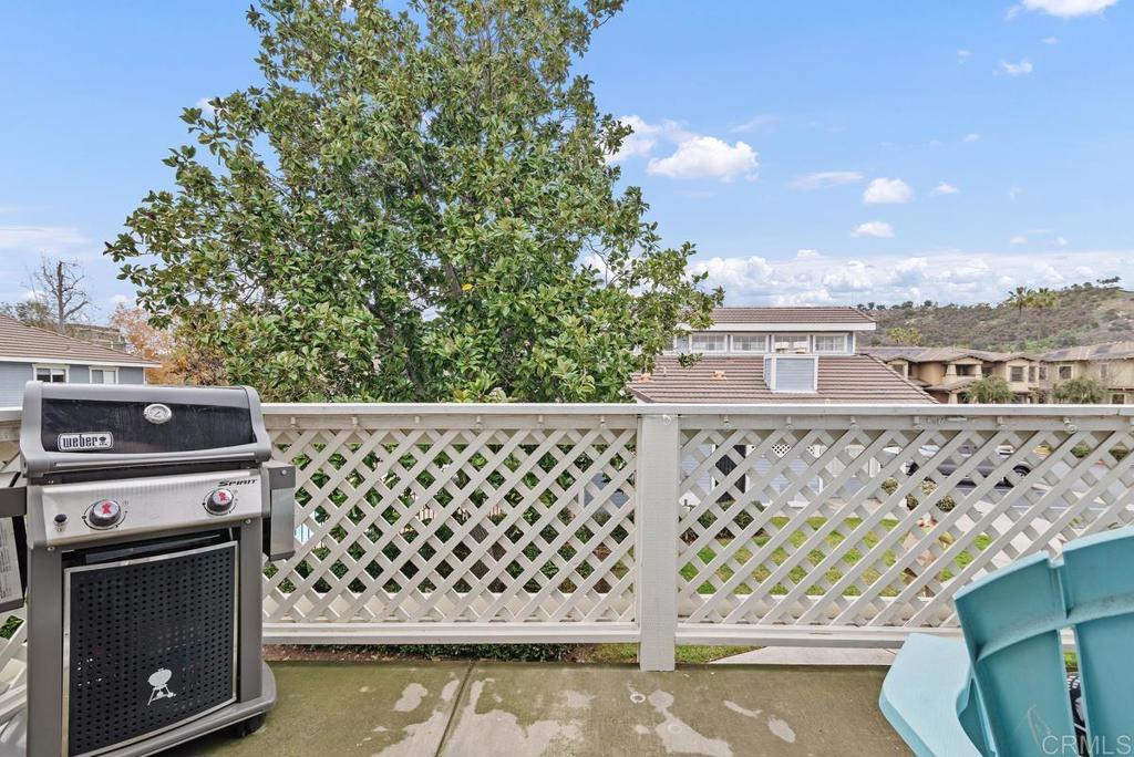 13981 Midland Road Poway, CA 92064 - Photo 18 of 26 a view of a balcony with wooden fence