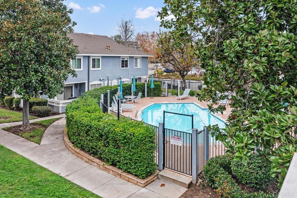 13981 Midland Road Poway, CA 92064 - Photo 26 of 26 a front view of a house with a yard and potted plants