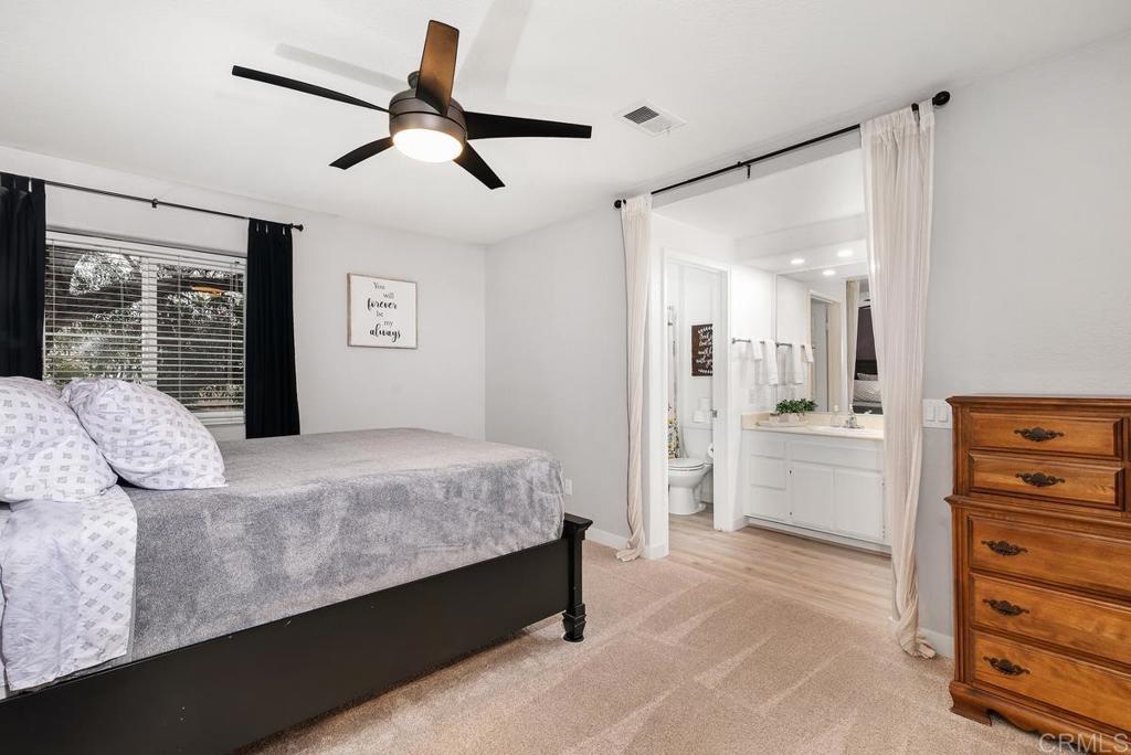 13981 Midland Road Poway, CA 92064 - Photo 9 of 26 a bedroom with a bed and a dresser