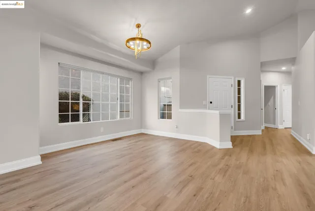 a kitchen with stainless steel appliances granite countertop a stove and a sink
