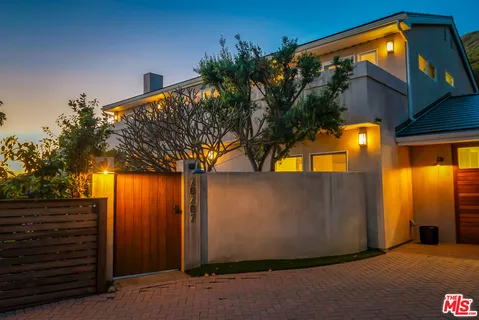 a view of outdoor space yard and front view of a house
