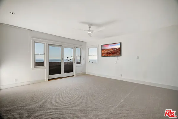 a bathroom with a granite countertop sink mirror and bathtub