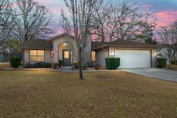 a house with trees in front of it