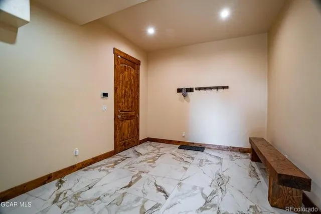 a view of a livingroom with wooden floor