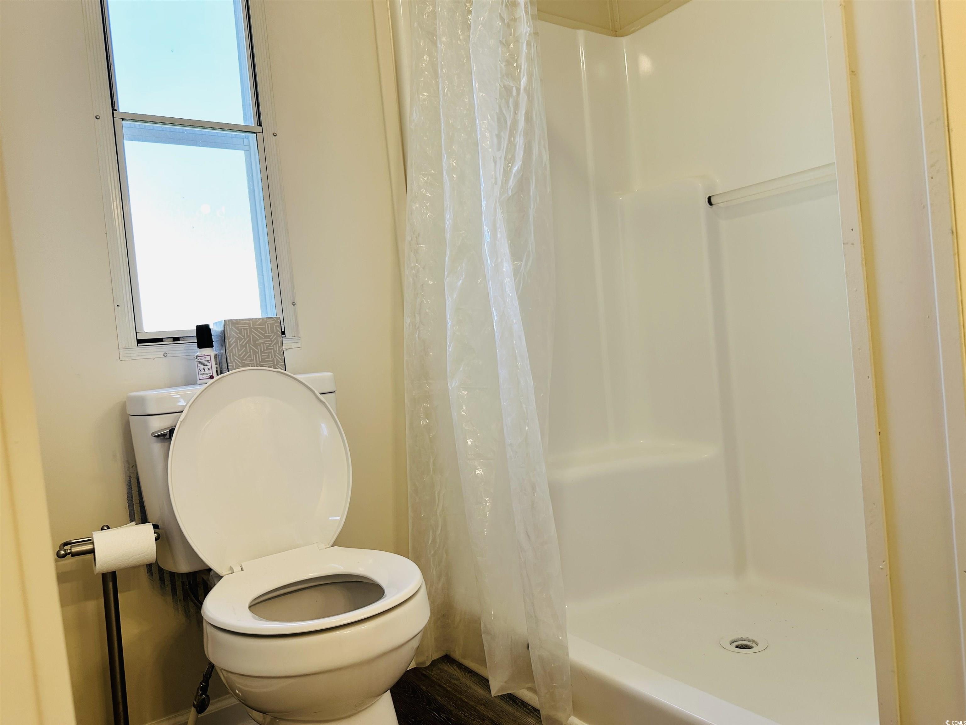 2067 Willow Creek Road Effingham, SC 29541 - Photo 40 of 40 Full bathroom with toilet and a stall shower