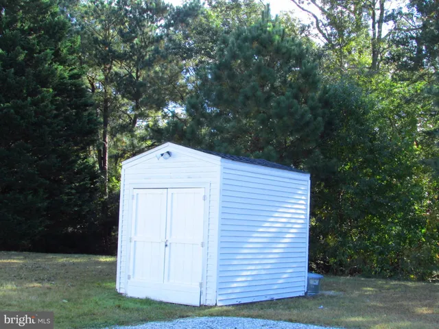 a wooden door with yard