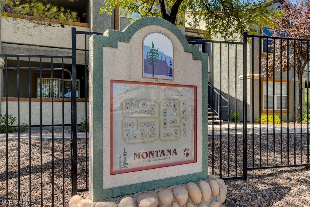555 East Silverado Ranch Boulevard, Unit 2124 Las Vegas, NV 89183 - Photo 40 of 47 Secure community entrance with an inviting map display guides residents and guests.