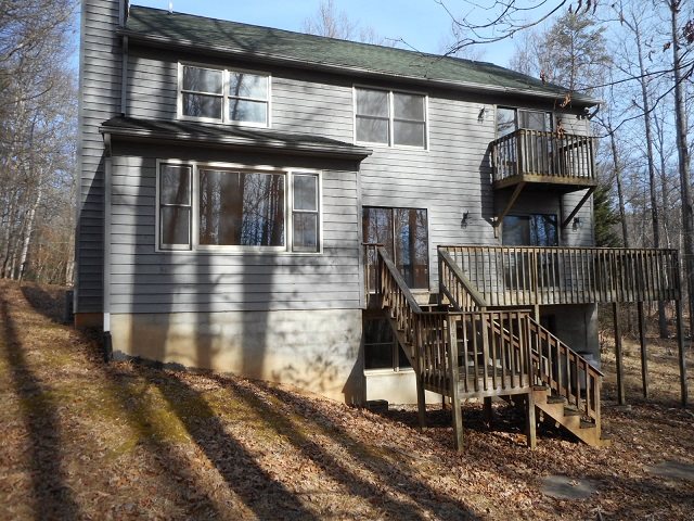 4201 Garth Road Charlottesville, VA 22901 - Photo 2 of 20 a front view of a house with a yard