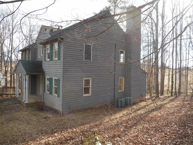 4201 Garth Road Charlottesville, VA 22901 - Photo 4 of 20 a view of a house with a yard and wooden fence