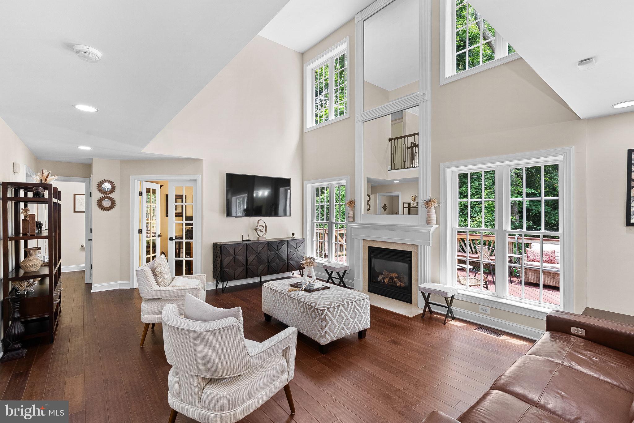 7214 Calamo Street Springfield, VA 22150 - Photo 21 of 77 Living room with tall windows