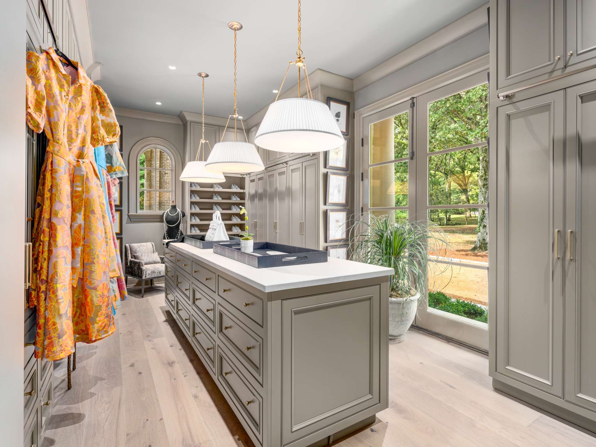 1358 Page Road Nashville, TN 37215 - Photo 16 of 35 a kitchen that has a lot of white cabinets and a wooden floor