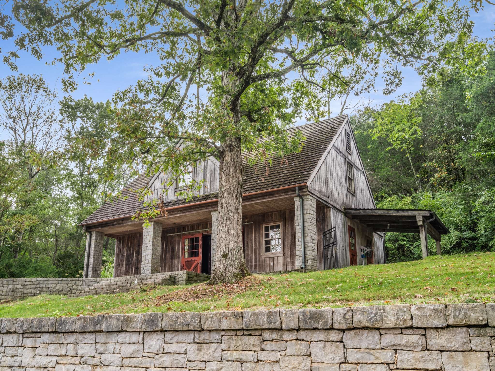 1358 Page Road Nashville, TN 37215 - Photo 35 of 35 a front view of a house with garden