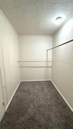 a view of a refrigerator in kitchen