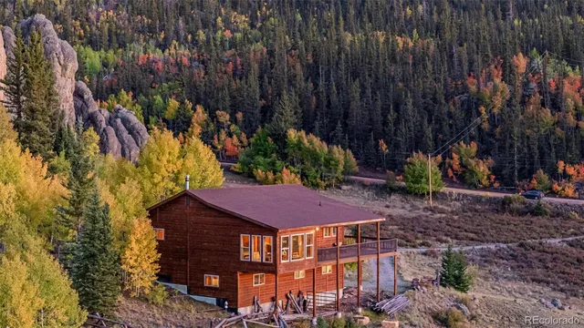 a view of a backyard with plants and a yard