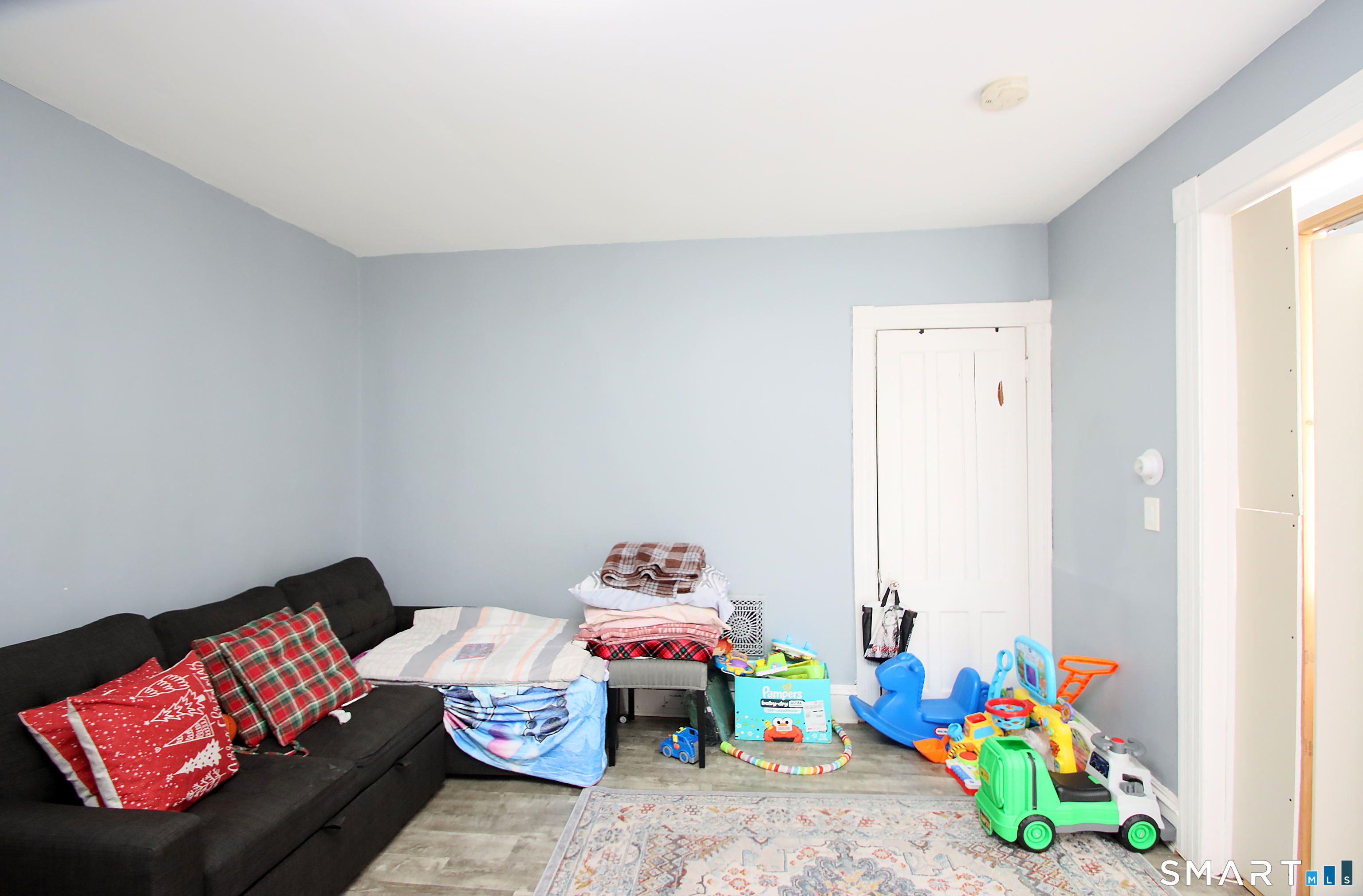 750 William Street Bridgeport, CT 06608 - Photo 14 of 35 a room with toys and a couch