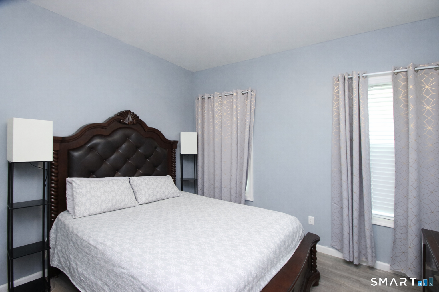 750 William Street Bridgeport, CT 06608 - Photo 17 of 35 a bedroom with a bed and window