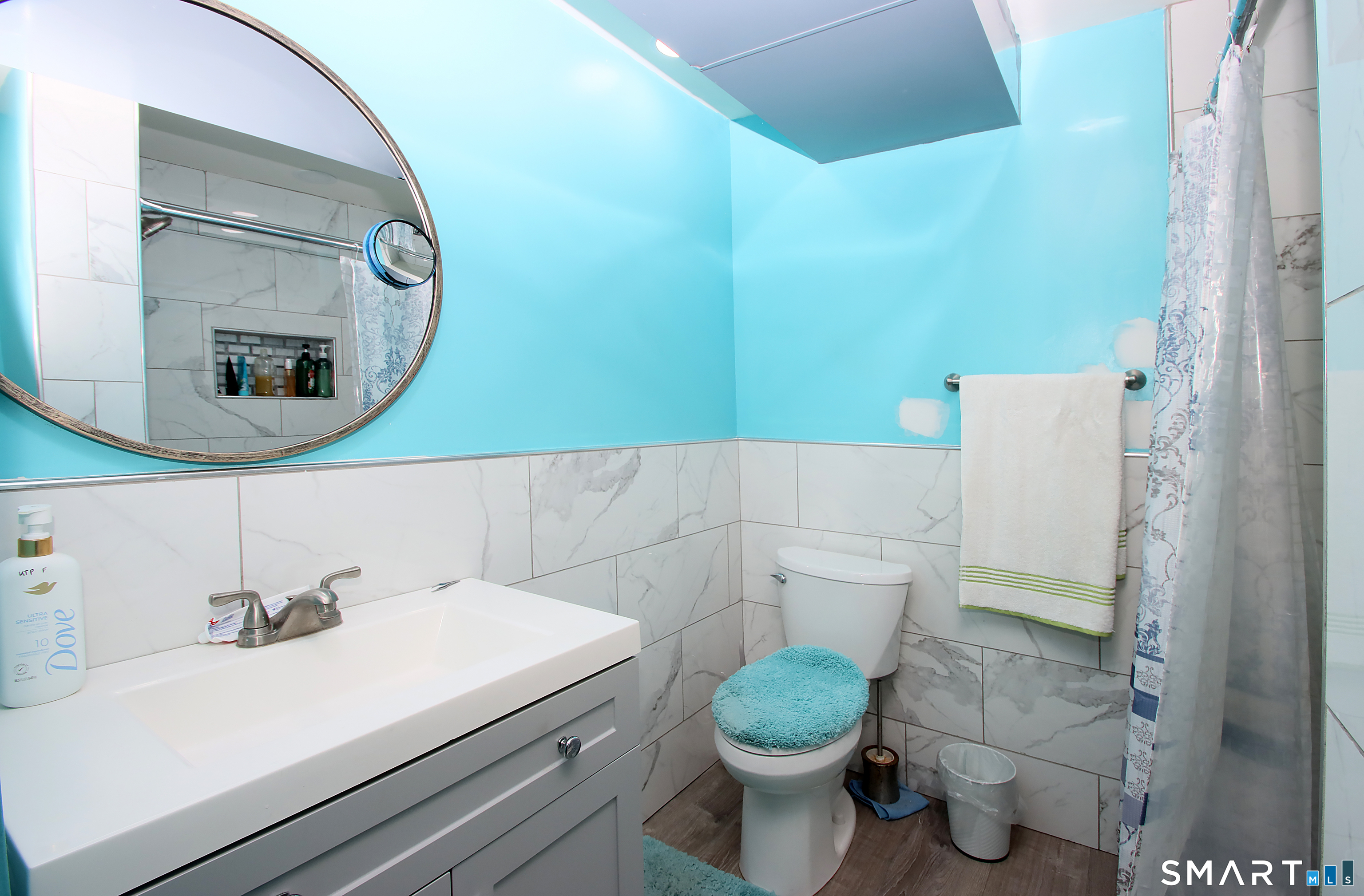 750 William Street Bridgeport, CT 06608 - Photo 21 of 35 a bathroom with a sink and a mirror