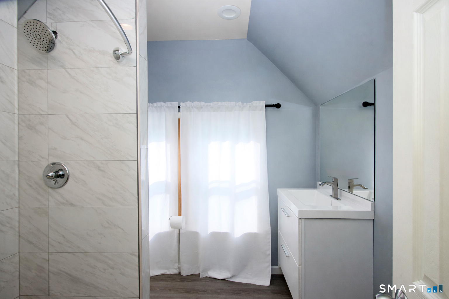 750 William Street Bridgeport, CT 06608 - Photo 24 of 35 a bathroom with a sink a toilet and shower