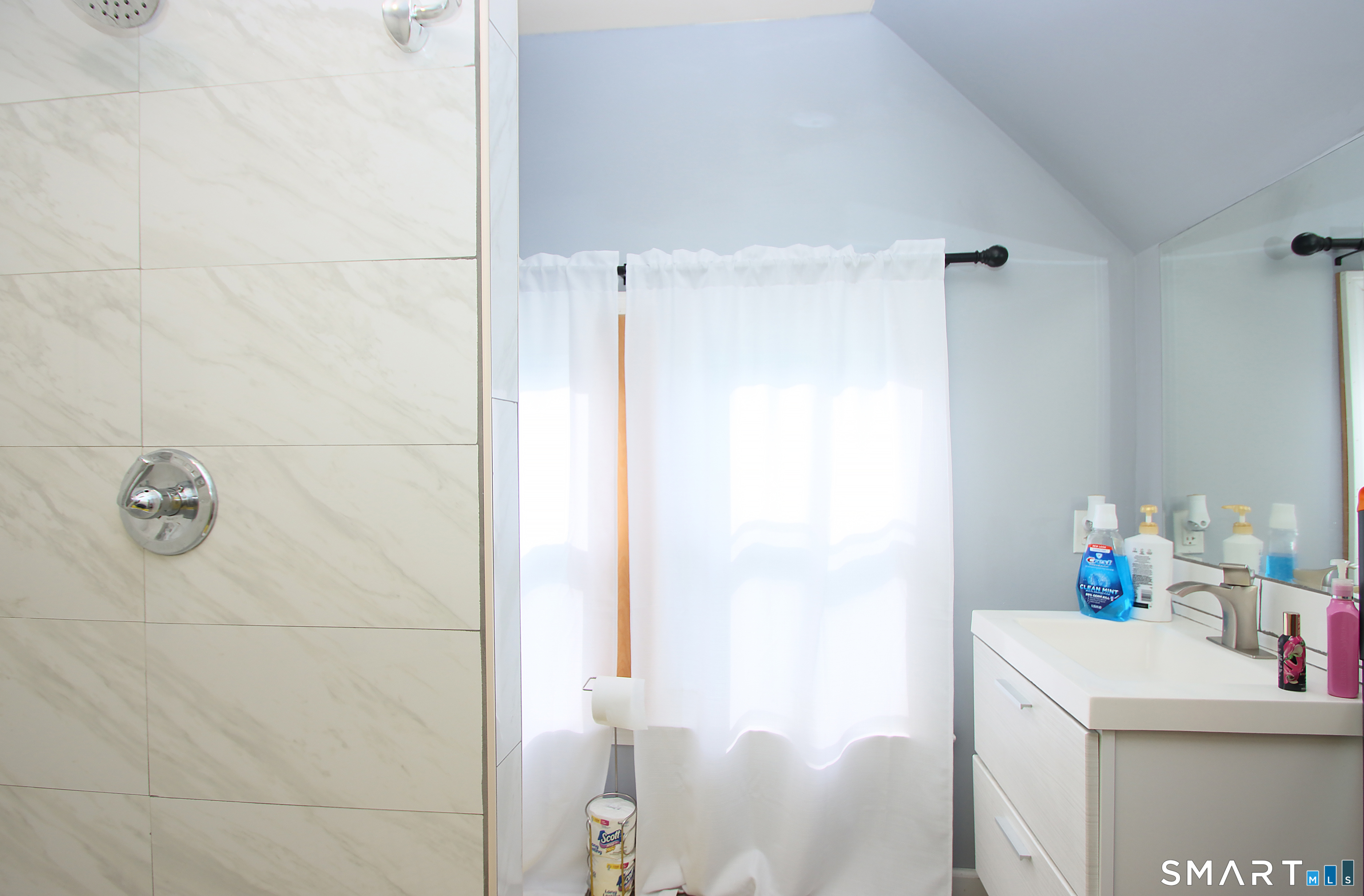 750 William Street Bridgeport, CT 06608 - Photo 27 of 35 a bathroom with a sink a toilet and shower