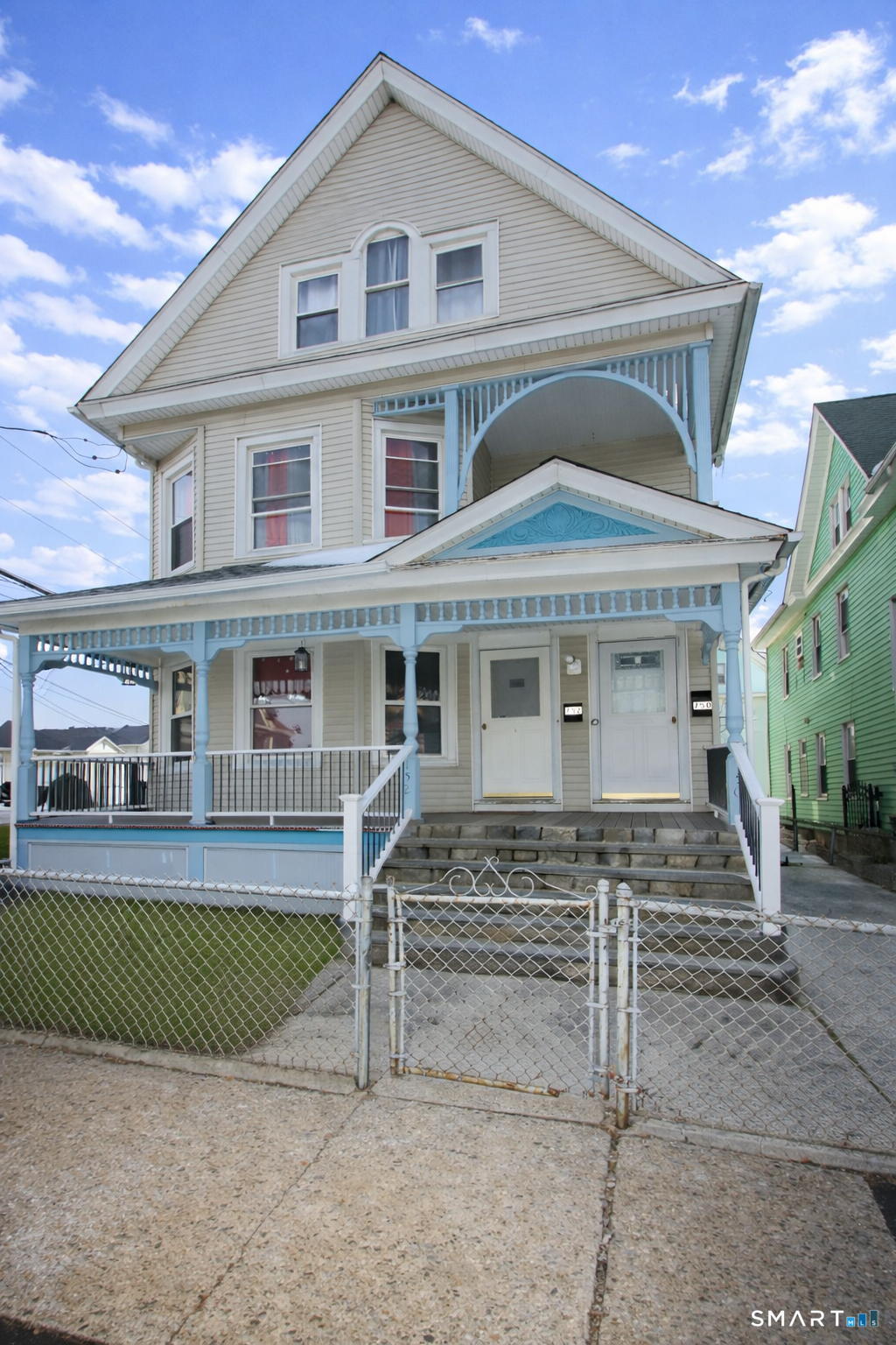 750 William Street Bridgeport, CT 06608 - Photo 34 of 35 a front view of a house with a yard and garage