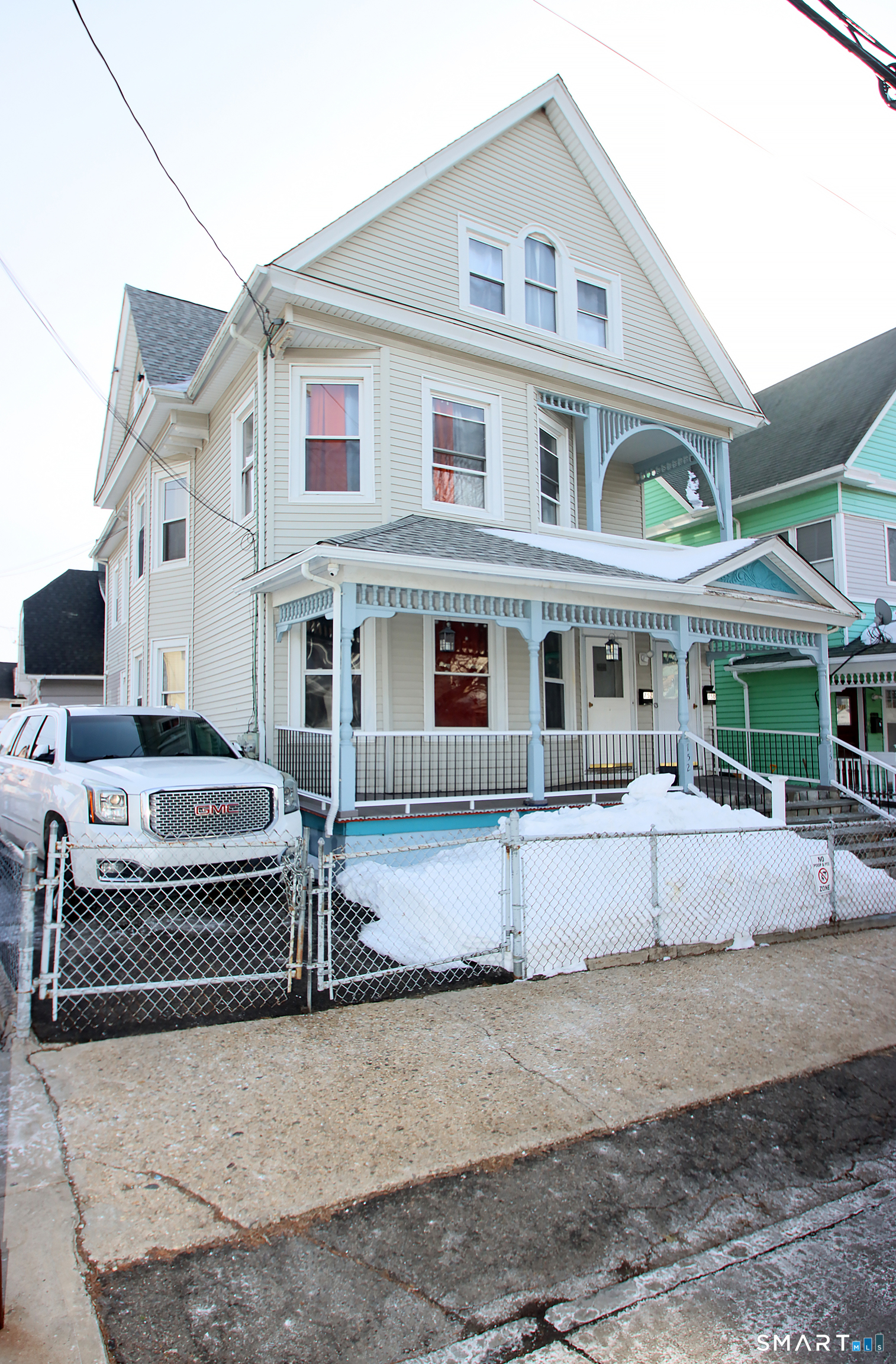 750 William Street Bridgeport, CT 06608 - Photo 4 of 35 a view of a white house with a large windows