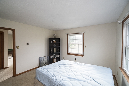 3629 Rockfish Road Grottoes, VA 24441 - Photo 11 of 32 a bedroom with a bed and a window