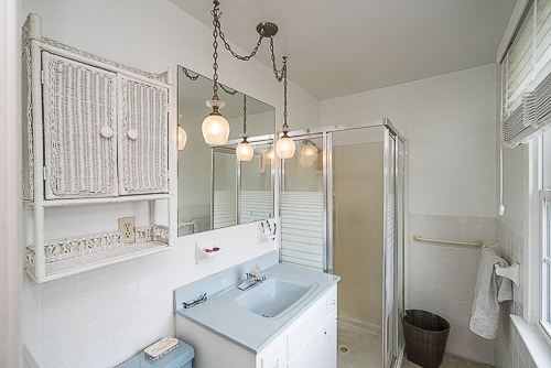 3629 Rockfish Road Grottoes, VA 24441 - Photo 15 of 32 a bathroom with a sink a toilet and shower