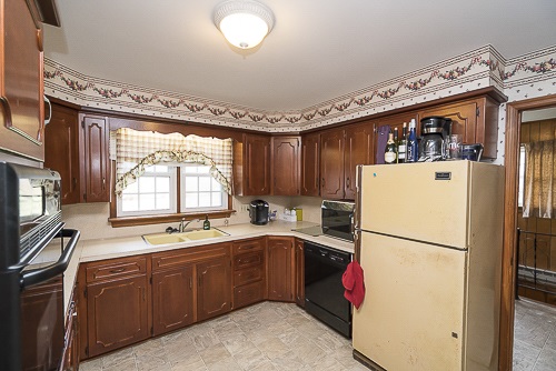 3629 Rockfish Road Grottoes, VA 24441 - Photo 24 of 32 a kitchen with sink refrigerator and window