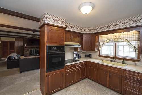 3629 Rockfish Road Grottoes, VA 24441 - Photo 25 of 32 a kitchen with stainless steel appliances granite countertop a refrigerator and a sink