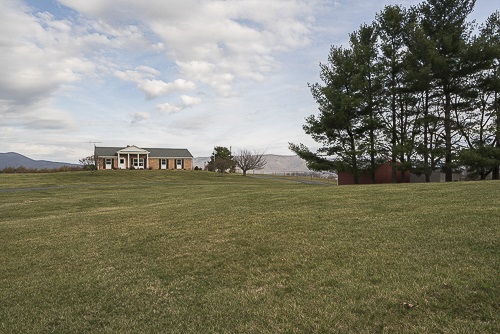 3629 Rockfish Road Grottoes, VA 24441 - Photo 5 of 32 a view of a field with an trees