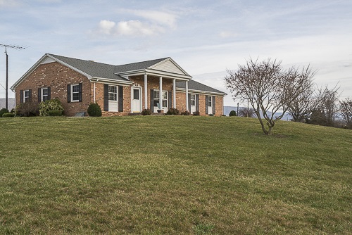 3629 Rockfish Road Grottoes, VA 24441 - Photo 9 of 32 a front view of a house with a yard