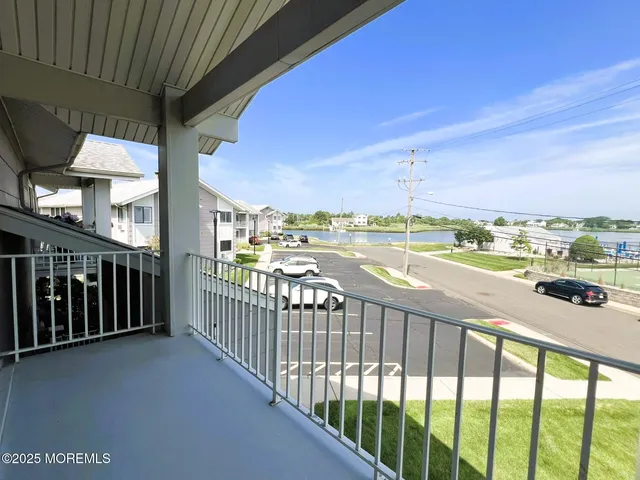 a view of a balcony with city view