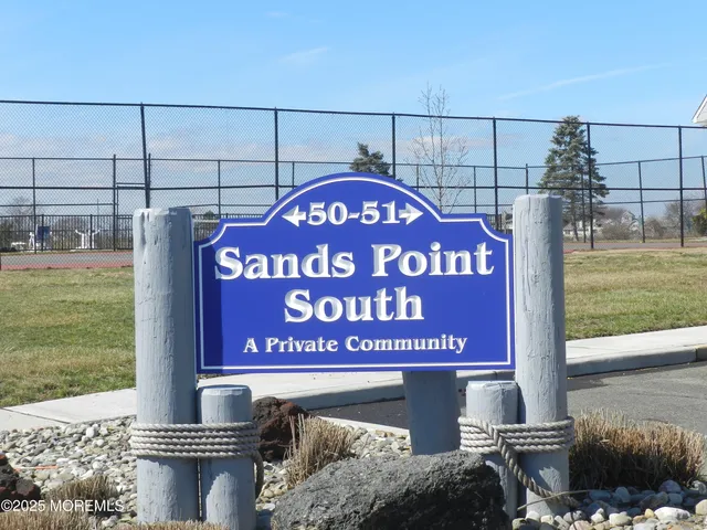 a view of a street with a building in the background