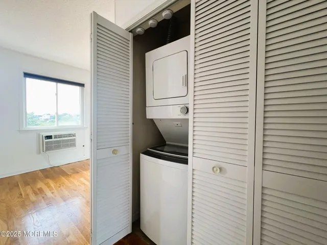 a view of kitchen with wooden floor