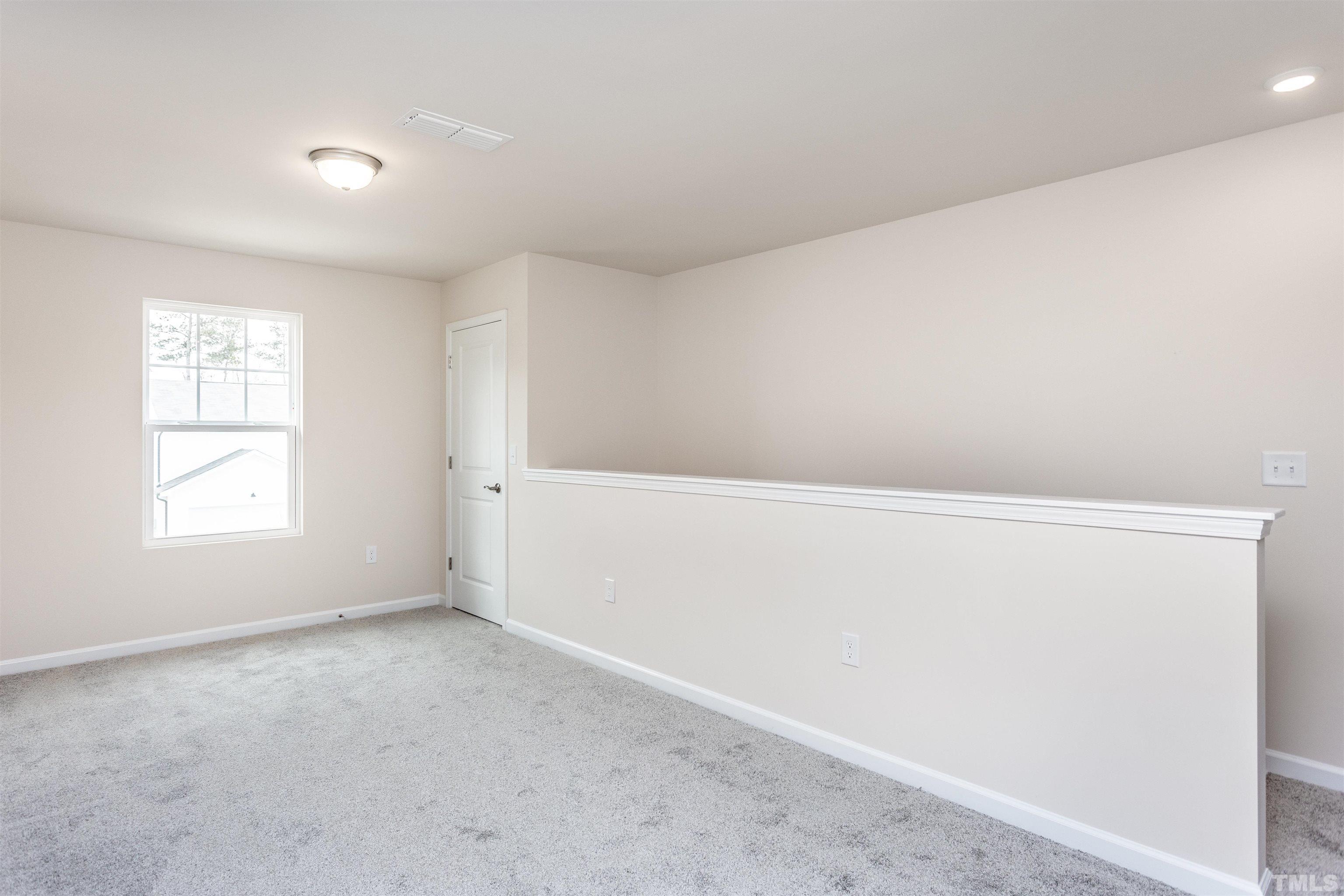 3469 Dragonfly River Raleigh, NC 27604 - Photo 19 of 26 a view of room with window