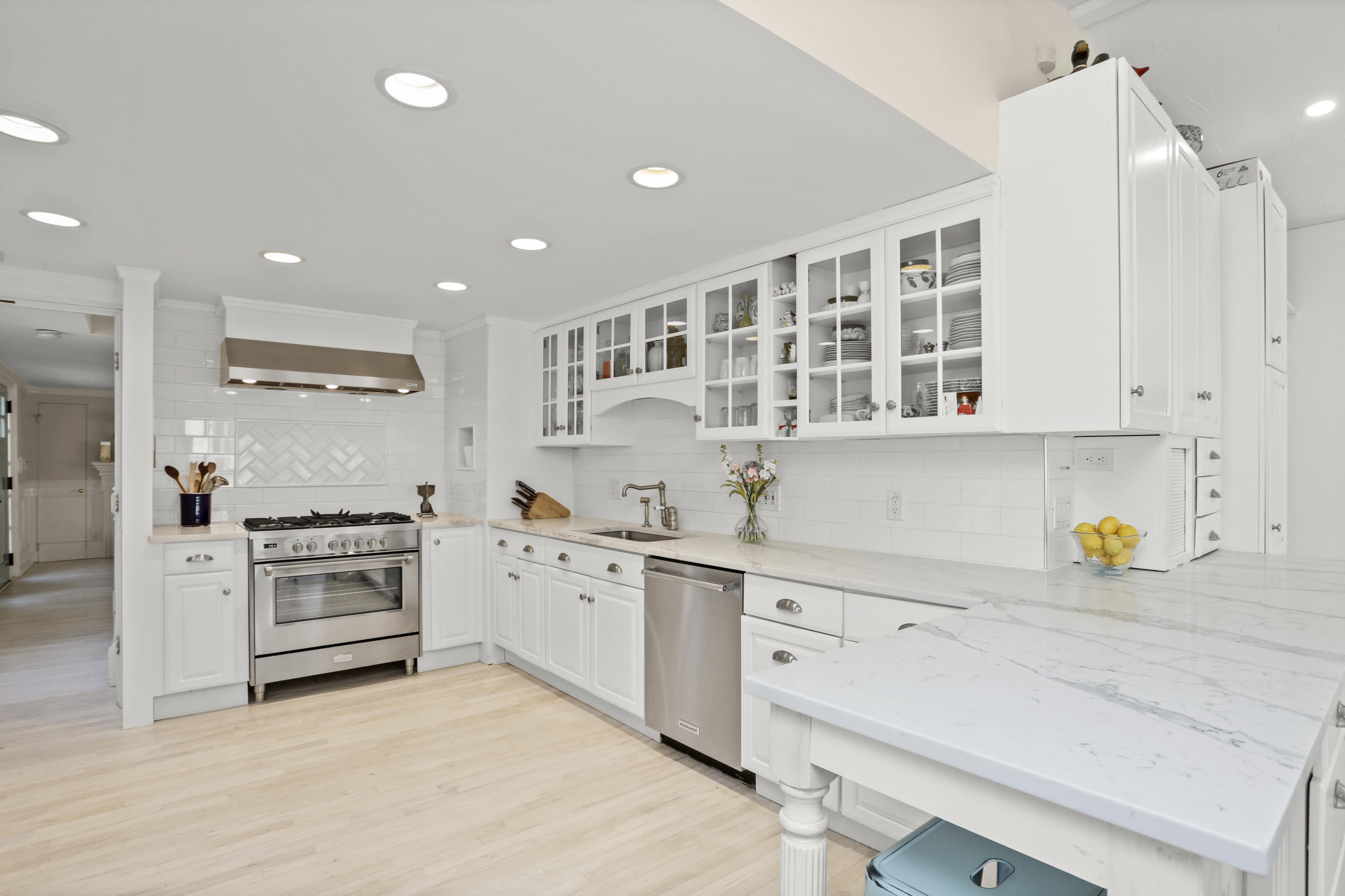 23 Fairmead Road Darien, CT 06820 - Photo 11 of 47 a kitchen with a sink stove and cabinets