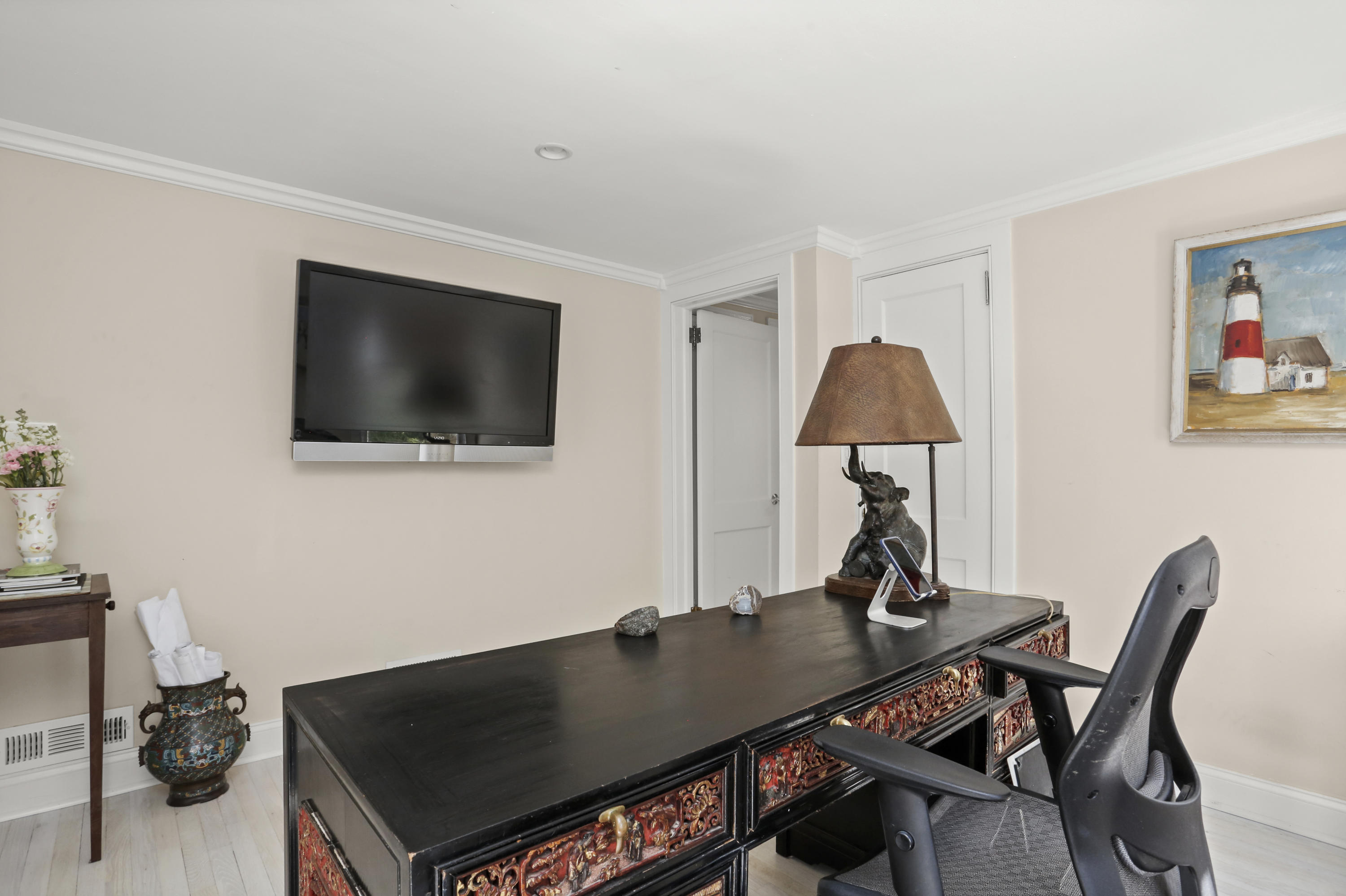 23 Fairmead Road Darien, CT 06820 - Photo 16 of 47 a living room with furniture and a flat screen tv